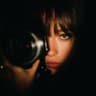 Behind the Lens